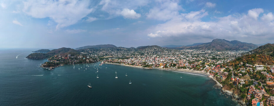 Aerial view of Ixtapa Zihuatanejo beach, Costa Grande of Guerrero. Coastal landscape with hotels and crystal clear sea. Zihuatanejo, Guerrero, Mexico.
