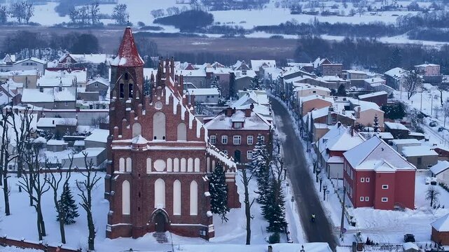 Aerial winter Teutonic church Radzyn Poland slide 2. Brick Gothic monastery castle built 1234 AD, Teutonic Knights. Northern royal town.  Historical buildings. Saint Anne church 12th century.