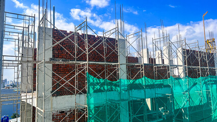High-Rise Construction Stage in Vietnam with Green Safety Netting