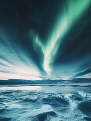 Naklejka premium Green aurora borealis over snowy mountain and frozen lake at night. Stars in dark sky.