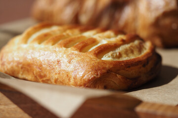 Freshly baked pastry on kitchen counter in sunlight