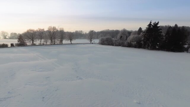Aerial footage of a deeply snow-covered landscape outside Hamburg