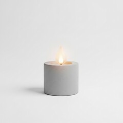 Lit white candle on a plain white background with soft shadow.
