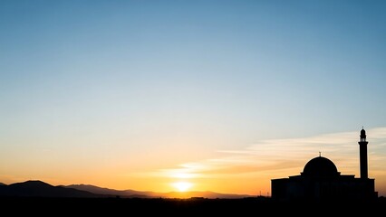 Obraz premium Mosque Silhouette at Sunset with Minaret.