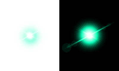 Teal green lens flare effect on transparent and black background with bright glowing light star burst and optical bokeh sparkle cool rays