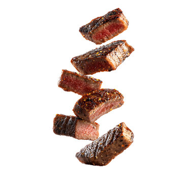 Steak Slices Flying in Air Dynamic Food Composition Isolated on Transparent Background