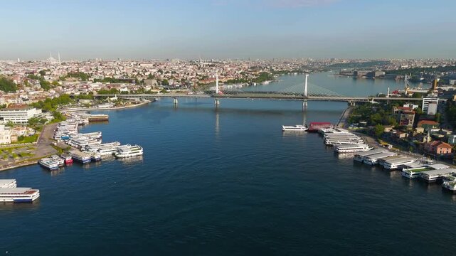 Istanbul, Turkey. Golden Horn Metro Bridge and Halic Station aerial drone view in morning sunlight. Aerial View