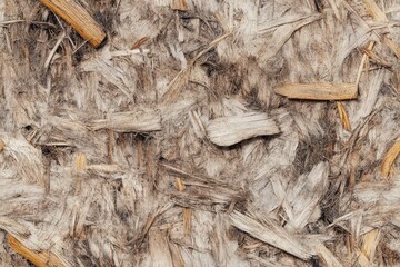 Close-up view of a textured wood fiber composite material. Seamless pattern.