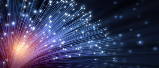 Fiber optic light burst glowing blue and purple strands evoke futuristic connectivity and motion