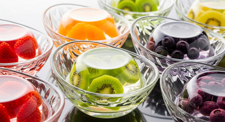 Elegant Jelly Desserts in Glass Bowls With Vibrant Fruit Layers
