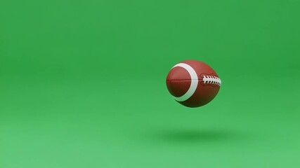 American football flies through green screen with motion blur effect