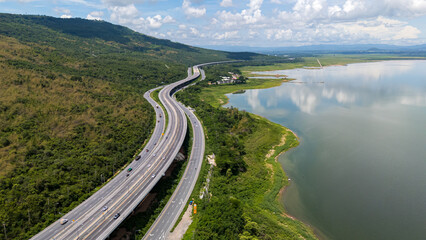 Drone shot The M6 motorway Nakhon Ratchasima Province - Bang Pa-in Lam Ta Khong River and Mountain. Motorway Korat Thailand