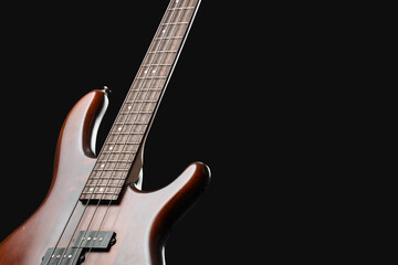 Obraz premium Modern electric guitar on black background
