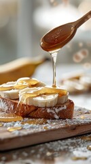 Honey Banana Toast: A close-up slice of artisan toast, with fresh banana slices and drizzled with golden honey