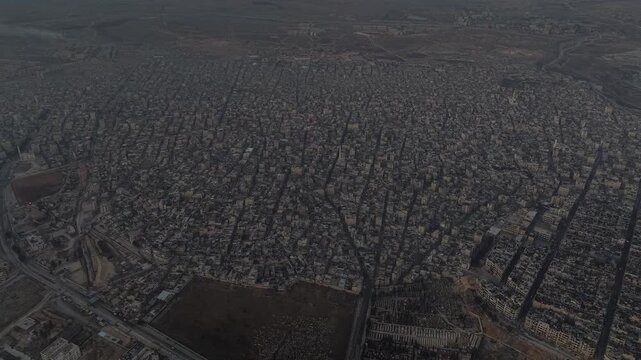 Drone shot of Syria showing buildings destroyed by the war, infrastructure and reconstruction.