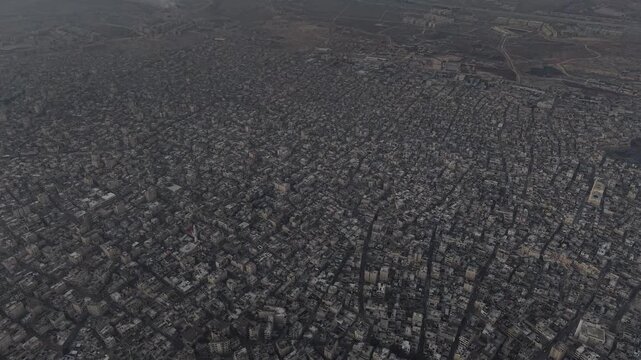Drone shot of Syria showing buildings destroyed by the war, infrastructure and reconstruction.