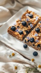 Baked Oatmeal Squares with Blueberries Cornflowers Beige Background