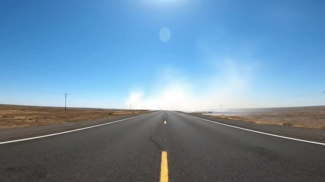 Summer Heat Effect Illustrating the tangible visual representation of extreme summer temperatures and their impact on the environment, seen through atmospheric distortion over a desolate landscape.