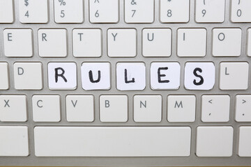 Computer keyboard with word RULES, closeup