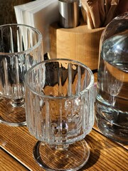 Empty Glasses on Wooden Table