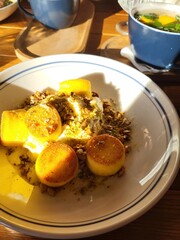 Baked cheesecakes with nuts, honey and cream - top view