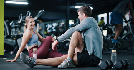 Friends, smile and discussion in gym with stretching, start workout and exercise for bonding...