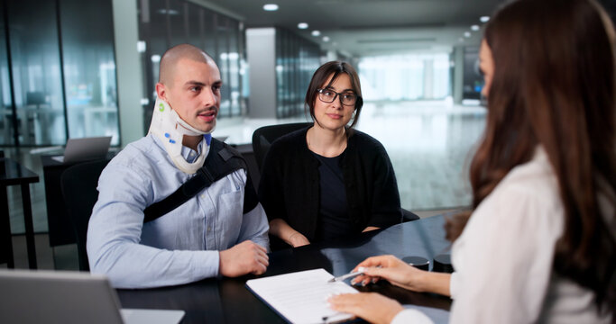 Happy Worker Smiles After Receiving Injury Claim Settlement