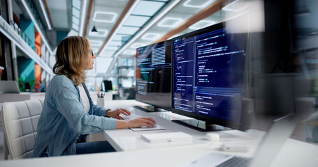 Skilled Female Software Developer Leading Coding Team