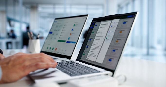 Hispanic Man Using Online Document Management Software