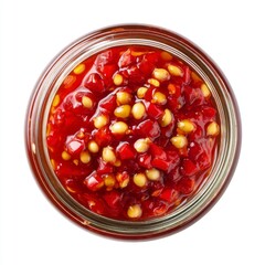 Vibrant Red Chili Sauce with Colorful Seeds in Glass Jar for Culinary Use and Recipe Inspiration