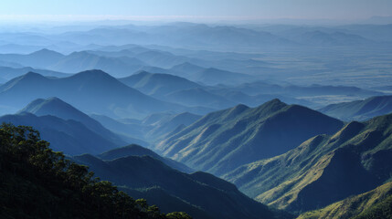 Fototapeta premium Mountain Range with Misty Valleys at Dawn