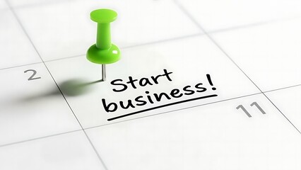 A green pin marking the date on the calendar with the words &ldquo;Start a business!&rdquo; 