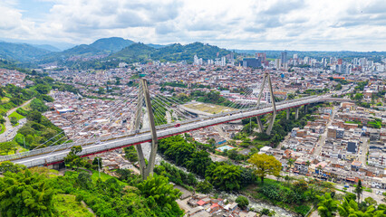 Stunning aerial view of Pereira Bridge connecting urban areas of Pereira, Risaralda, surrounded by...