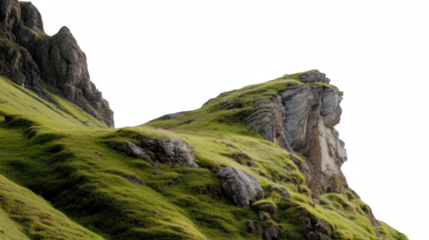 Vibrant green grassy slopes and rugged rock formations on a natural mountain landscape