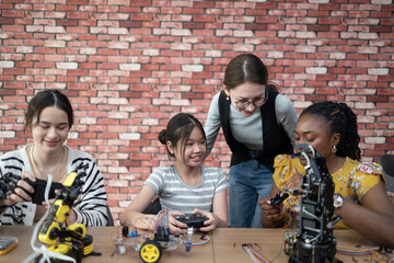 group of students and teacher and how to build and design robots in the classroom