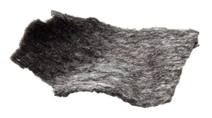 A jagged fragment of thick grey felt fabric with fuzzy texture on a white background for design and craft projects with material and arts and crafts