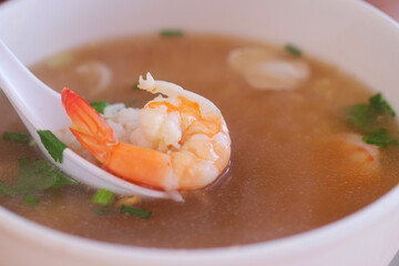 Shrimp soup in a white bowl,Thai style food.
