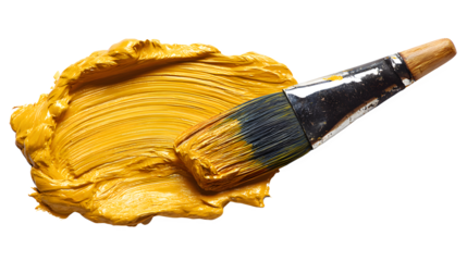 A painters palette knife smeared with heavy body golden yellow paint and a paintbrush on a white background for art and design with creative