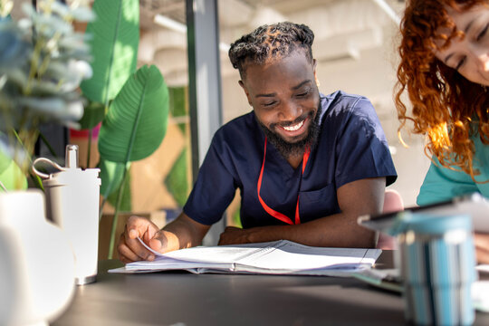 Medical students studying in the cafeteria