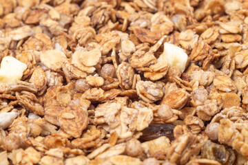 Baked muesli as a texture, background, pattern, close-up, side view