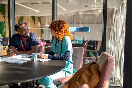 Medical students studying in the cafeteria