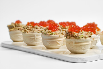Creative tuna tartlets served on a stylish platter for an elegant dining experience