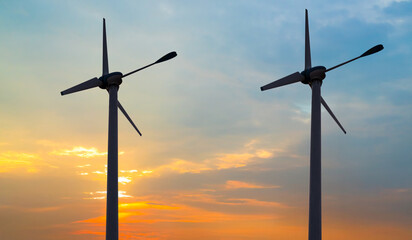 Wind mill power energy farm generator renewable sustainable field on suset, environment eco system technology industry ecology electricity power propeller turbine clean carbon. © wing-wing