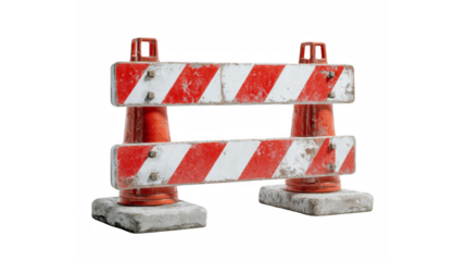 Dirty red and white traffic barrier for road construction isolated on a black background