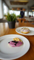 a cupcake on a white plate on a wooden table, breakfast menu in the morning, with natural lighting in the morning