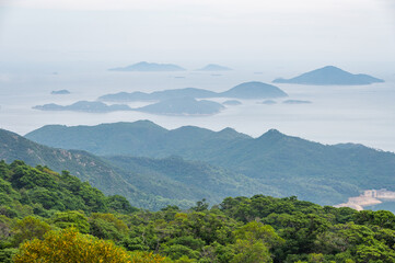 Fototapeta premium Beautiful view of the islands and the sea, Lantau island. Ngong Ping, to the Tian Tan Buddha or Giant Buddha. Hong Kong, China