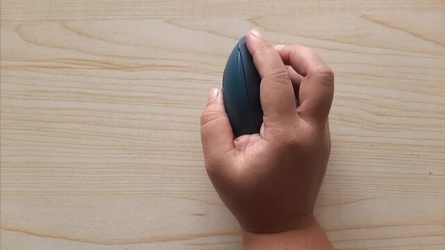 hand scrolling a vertical mouse wheel 