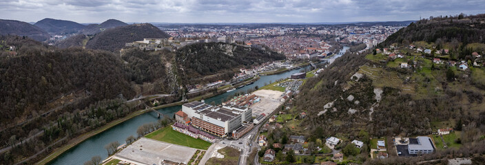 Aerial panoramic view of the old town city Besancon in France on a cloudy afternoon