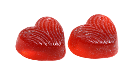 Two red heart shaped gummy candies isolated on transparent squared checkerboard backdrop