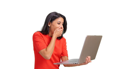 Woman covering mouth looking at laptop screen surprised